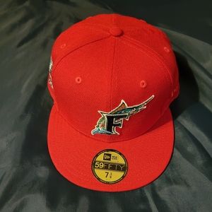 Brand new size 7 3/8 new era 59/50 fitted cap Florida Marlins in red.